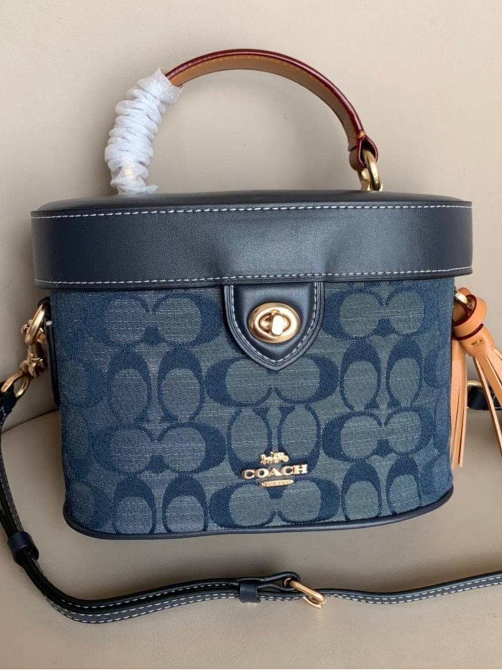 Coach Navy Signature Canvas Top Handle Bag with Tan Tassel